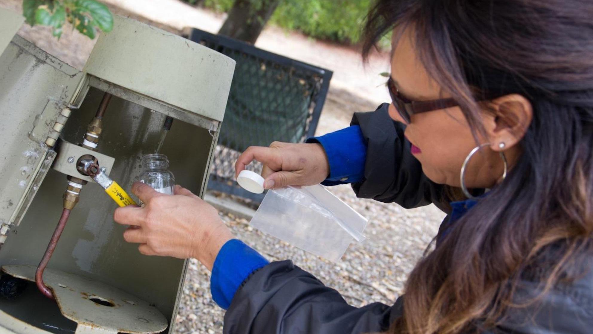 Woman testing water